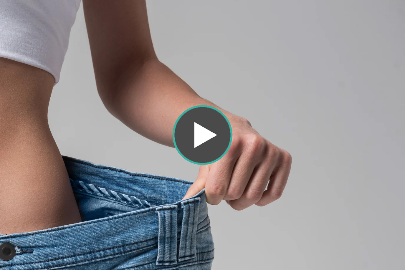 Woman stretching jeans