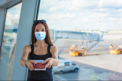 Woman wearing a mask in an airport